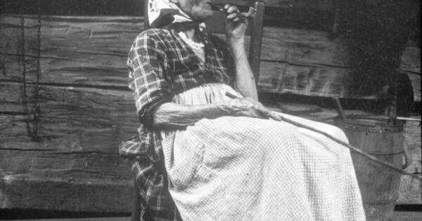 Stunning Portrait of an Old Woman Smoking a Pipe on Her Porch, Appalachia Mountains, 1917