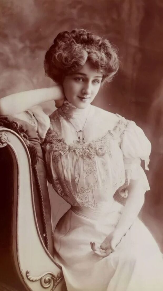 This image from about 1900 was reportedly adjusted by brushing paint over the waist so it would seem narrower.