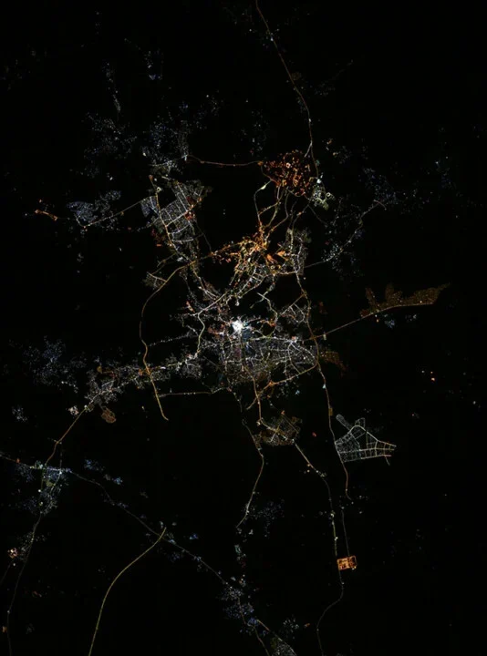 Nighttime ISS photograph of Mecca with the Grand Mosque glowing at the centre of the city