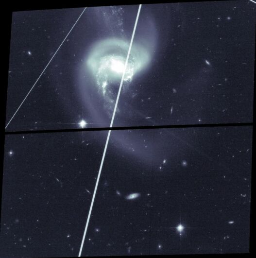 Satellite streaks crossing space telescope images in NASA contamination study